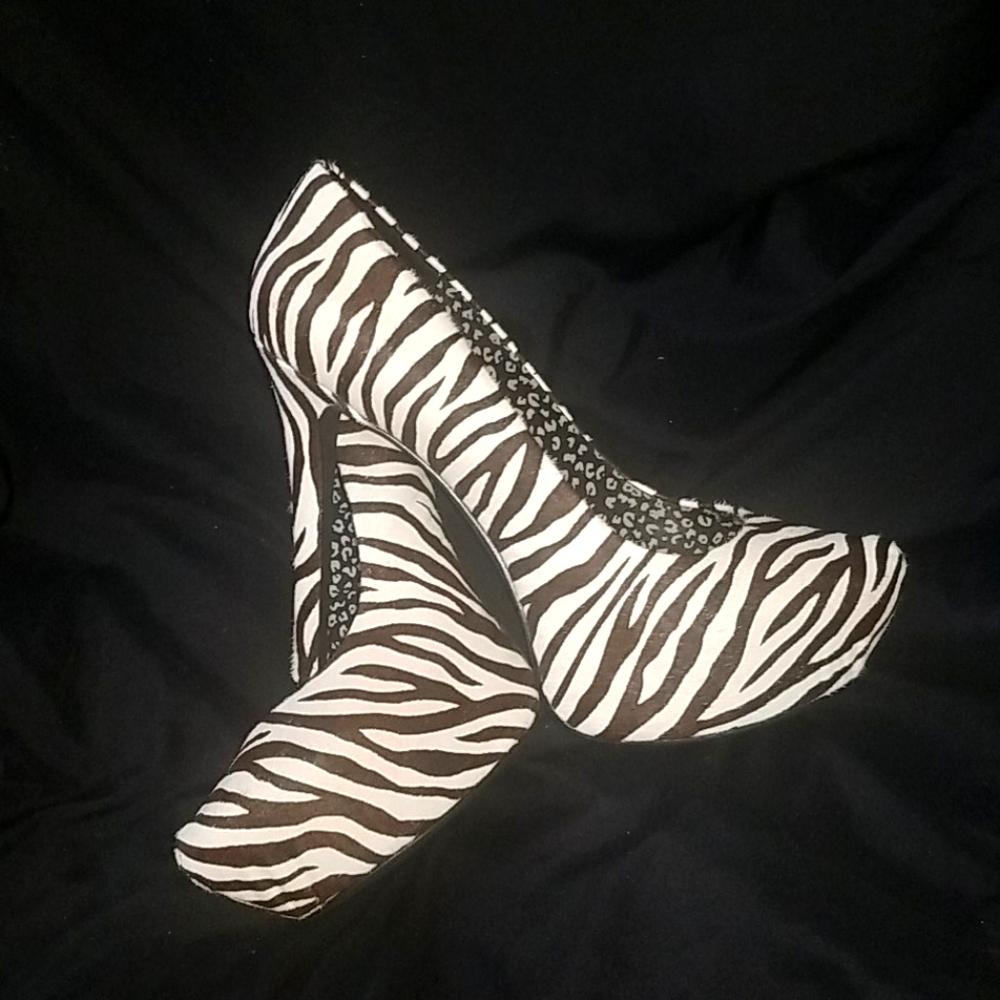 Zebra print faux suede pumps